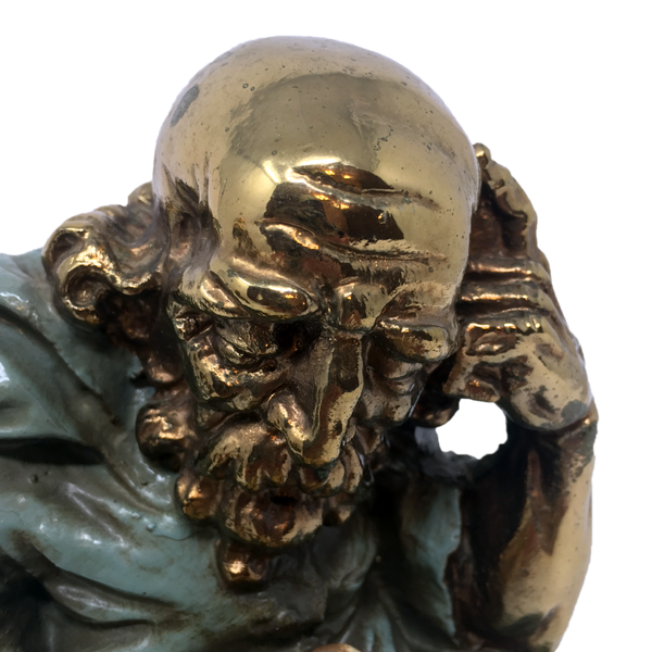 Antique bronze-clad alchemist with skull bookends by Marion Bronze circa 1922