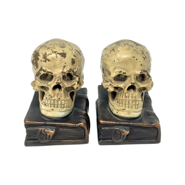 Antique bronze-clad skull and grimoire bookends by Armor Bronze circa 1922