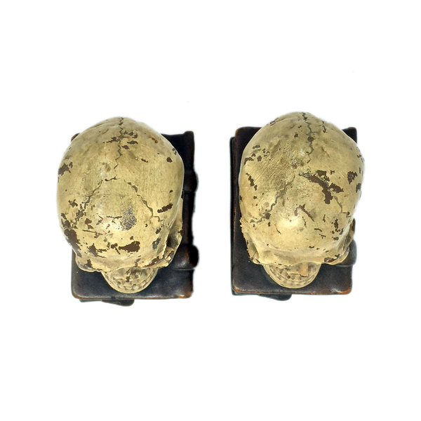 Antique bronze-clad skull and grimoire bookends by Armor Bronze circa 1922