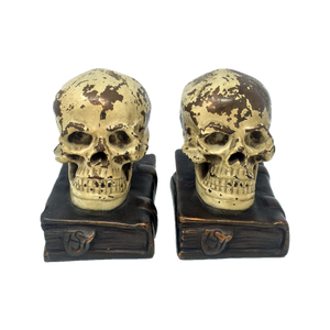 Antique bronze-clad skull and grimoire bookends by Armor Bronze circa 1922