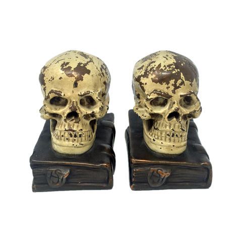 Antique bronze-clad skull and grimoire bookends by Armor Bronze circa 1922