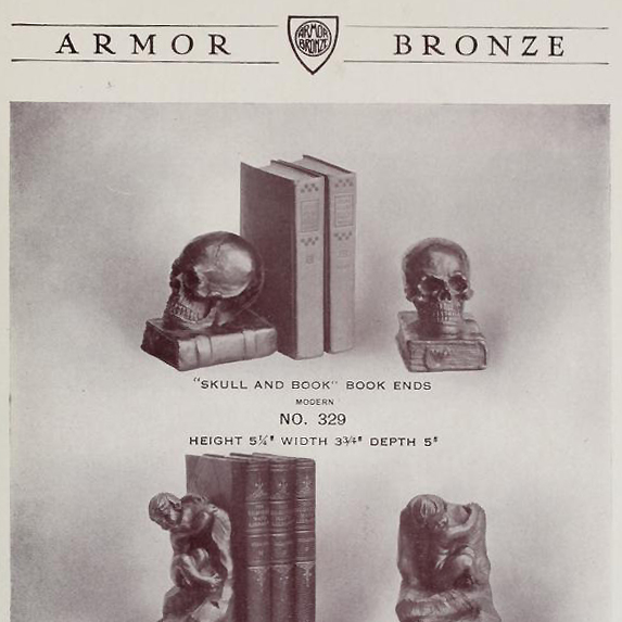 Antique bronze-clad skull and grimoire bookends by Armor Bronze circa 1922